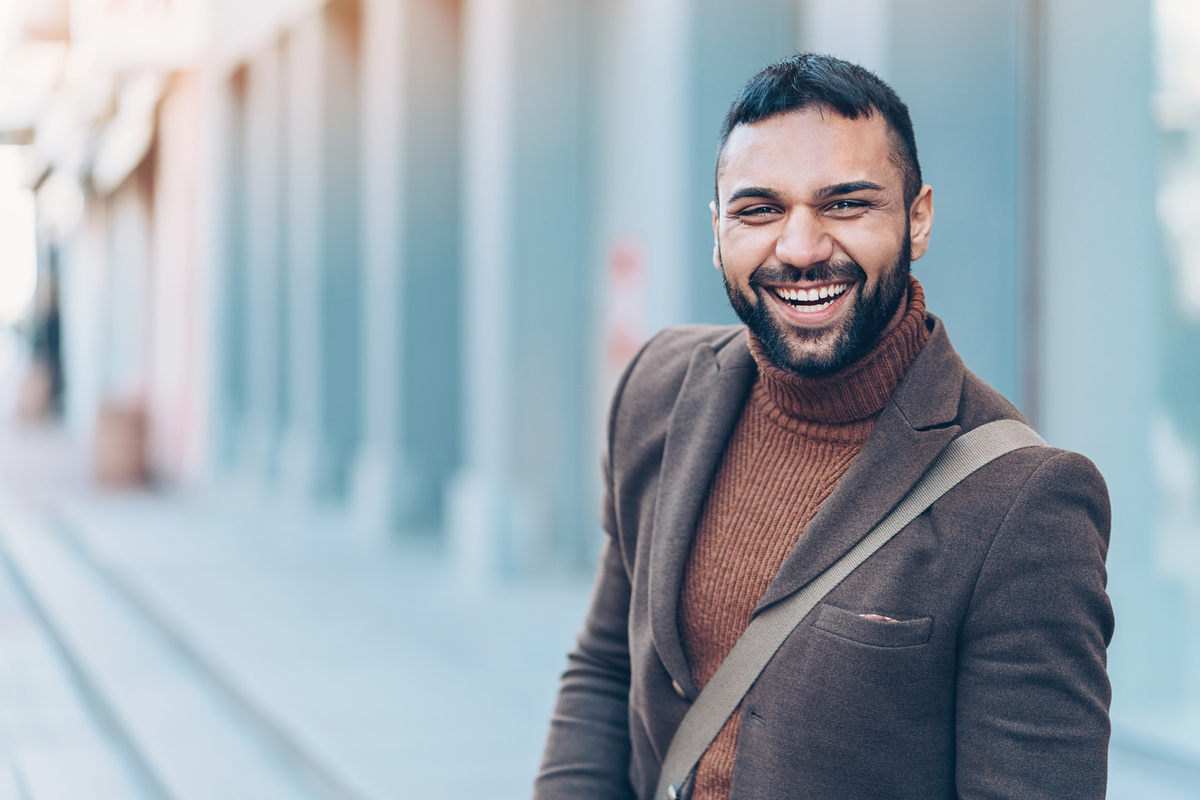 Cheerful young Middle-eastern ethnicity man